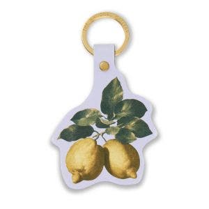 A recycled leather keyring showing a detail of lemon's from a painting.
