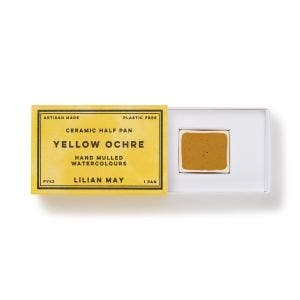 An open box of half pan watercolour paint.