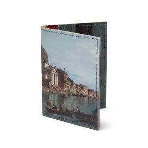 A wallet open showing fine details such as the painting, and stitching.