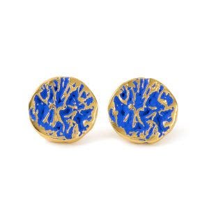 A set of gold-plated round stud earrings  with a blue textured design