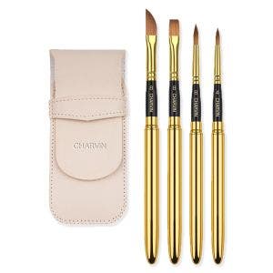 Four sable brushes in gold and black, and a beige pouch for storing and travelling.