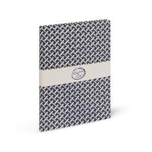 A navy patterned notebook.