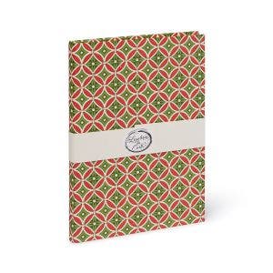 A red and green patterned notebook.