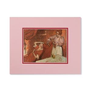 A pink and red mounted frame showing two women brushing hair.