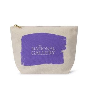 A white pouch with a sturdy zip showing a splash of violet paint.