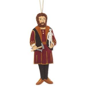 A felt and thread decoration of a brown bearded man holding a small statuette and sculpting tools.