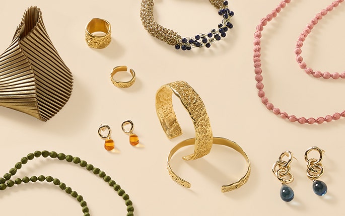 Jewellery pieces including bracelets and necklaces.